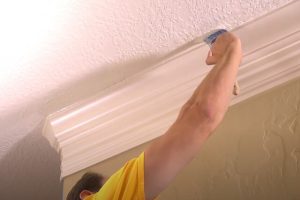 Glendale House Painters worker painting the ceiling trim