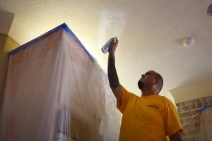 Glendale House Painter spray painting the ceiling